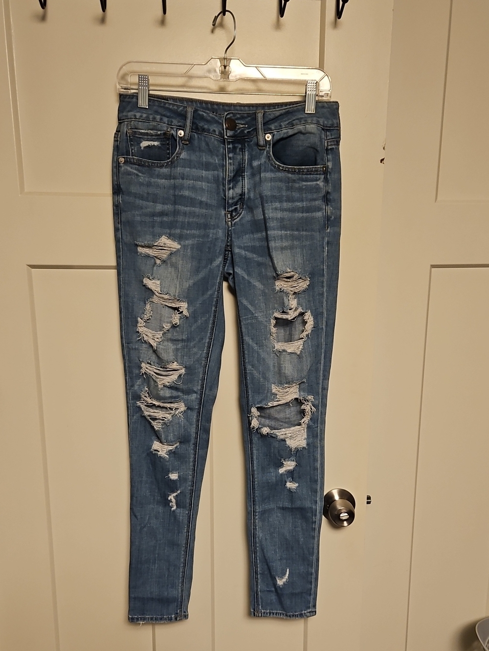 Distressed American Eagle Mid-Blue Women’s Boyfriend Jeans